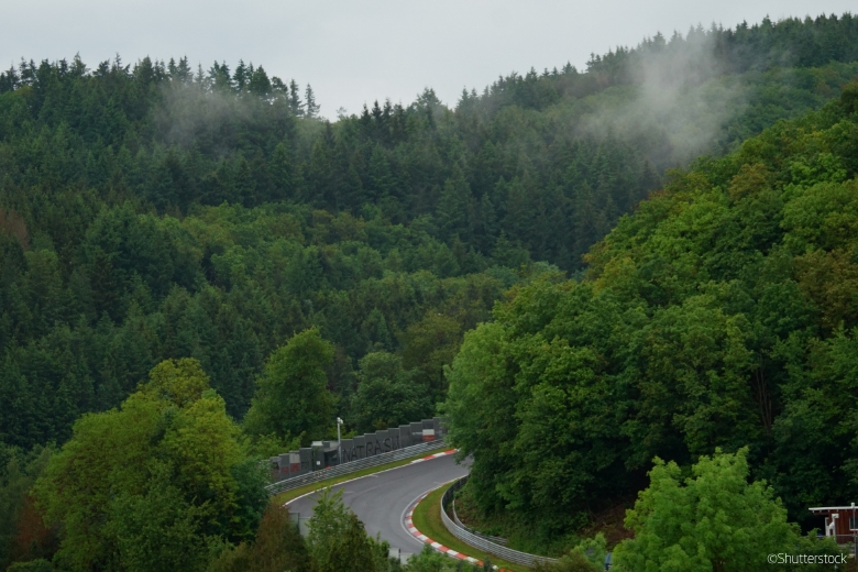 The Nürburgring Nordschleife, nicknamed the Green Hell due to its unpredictable weather and blind corners in the depths of a forest.