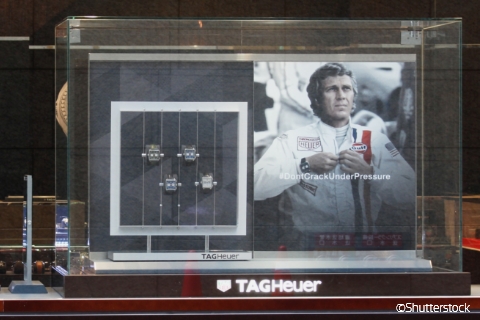A scene from Le Mans displayed at a TAG Heuer store. In the film, Steve McQueen appears as part of the Gulf Porsche team sponsored by Heuer watches..